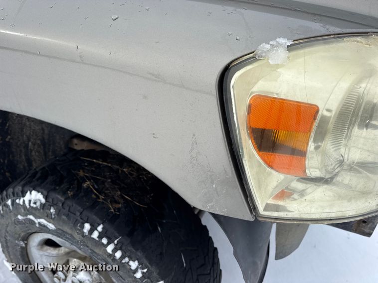 image for item EN0764 2009 Dodge Ram 2500 Quad Cab bale bed pickup truck