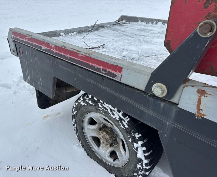 image for item EN0764 2009 Dodge Ram 2500 Quad Cab bale bed pickup truck