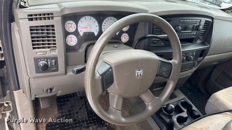 image for item EN0764 2009 Dodge Ram 2500 Quad Cab bale bed pickup truck