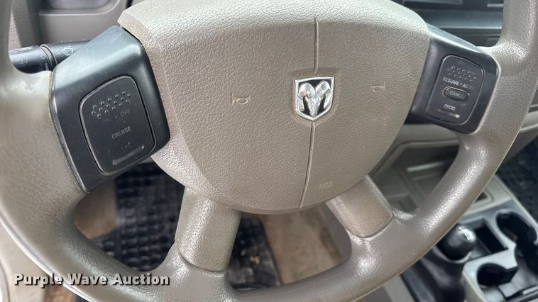 image for item EN0764 2009 Dodge Ram 2500 Quad Cab bale bed pickup truck