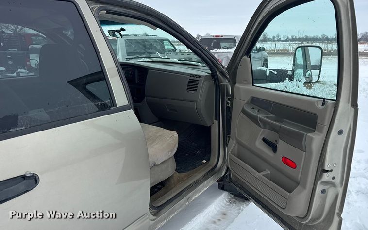 image for item EN0764 2009 Dodge Ram 2500 Quad Cab bale bed pickup truck