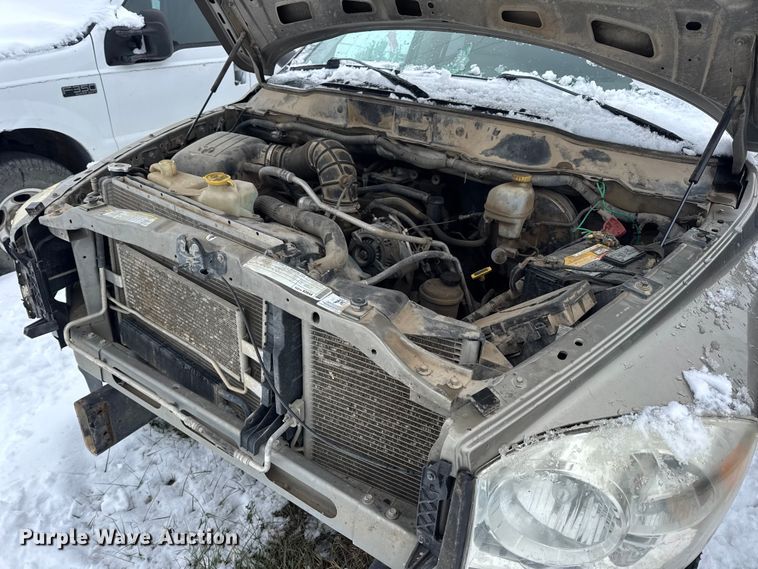 image for item EN0764 2009 Dodge Ram 2500 Quad Cab bale bed pickup truck