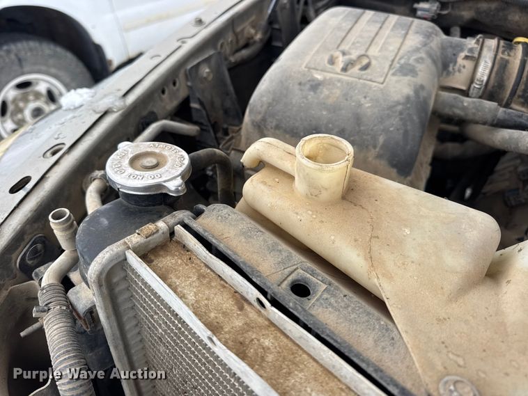 image for item EN0764 2009 Dodge Ram 2500 Quad Cab bale bed pickup truck