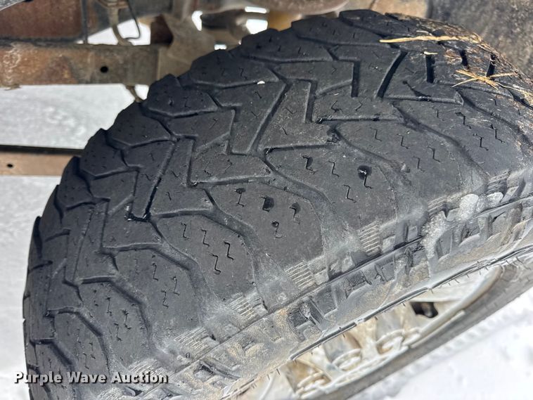 image for item EN0764 2009 Dodge Ram 2500 Quad Cab bale bed pickup truck