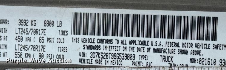 image for item EN0764 2009 Dodge Ram 2500 Quad Cab bale bed pickup truck