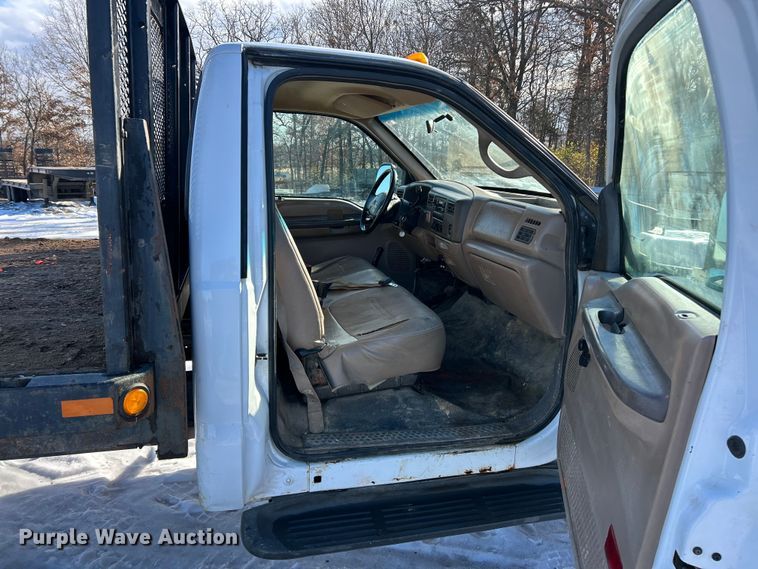 image for item ET6771 1999 Ford F550 flatbed truck