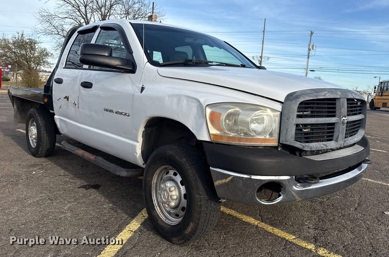 image for item EU4016 2006 Dodge Ram 2500 Quad Cab flatbed pickup truck
