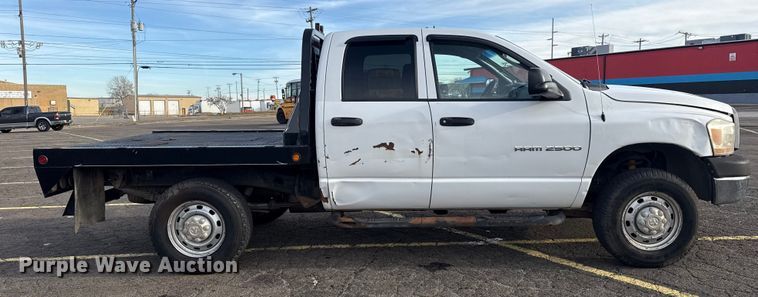 image for item EU4016 2006 Dodge Ram 2500 Quad Cab flatbed pickup truck