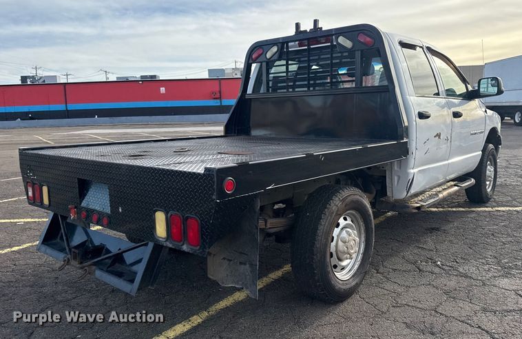 image for item EU4016 2006 Dodge Ram 2500 Quad Cab flatbed pickup truck