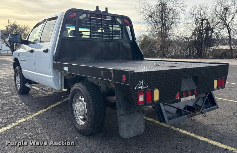 image for item EU4016 2006 Dodge Ram 2500 Quad Cab flatbed pickup truck