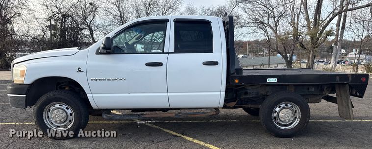 image for item EU4016 2006 Dodge Ram 2500 Quad Cab flatbed pickup truck