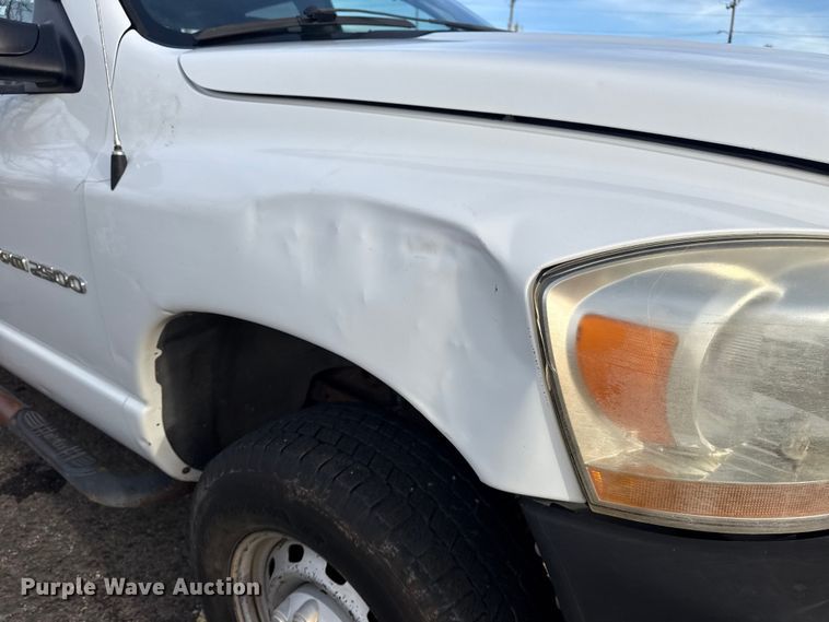 image for item EU4016 2006 Dodge Ram 2500 Quad Cab flatbed pickup truck