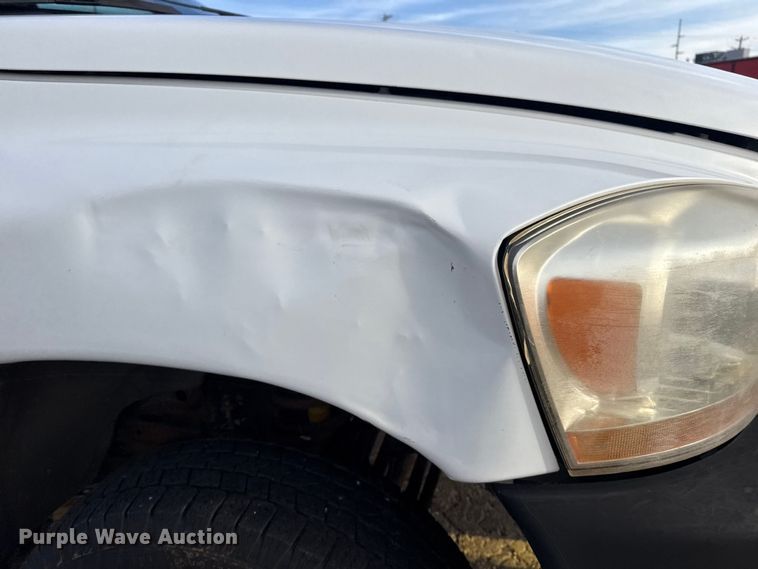 image for item EU4016 2006 Dodge Ram 2500 Quad Cab flatbed pickup truck