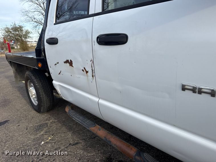 image for item EU4016 2006 Dodge Ram 2500 Quad Cab flatbed pickup truck