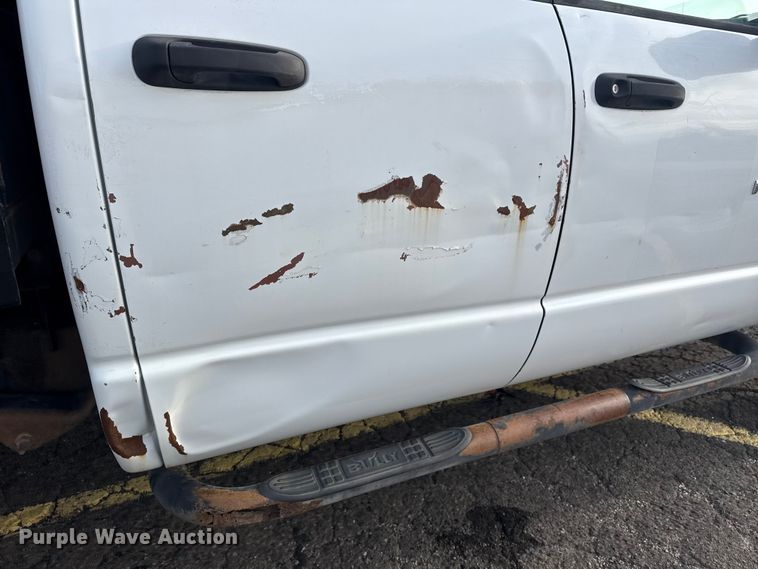image for item EU4016 2006 Dodge Ram 2500 Quad Cab flatbed pickup truck