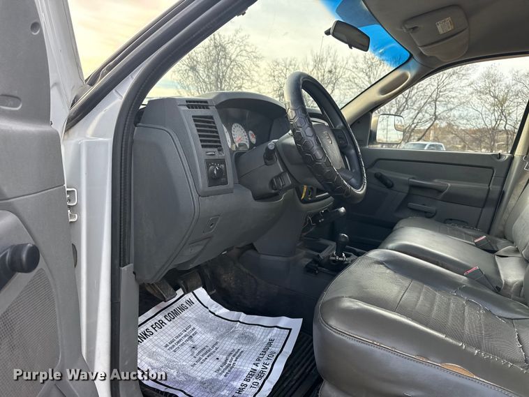 image for item EU4016 2006 Dodge Ram 2500 Quad Cab flatbed pickup truck