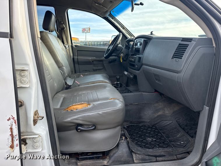 image for item EU4016 2006 Dodge Ram 2500 Quad Cab flatbed pickup truck