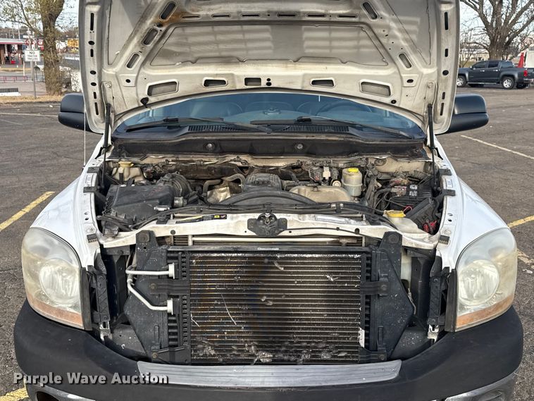 image for item EU4016 2006 Dodge Ram 2500 Quad Cab flatbed pickup truck