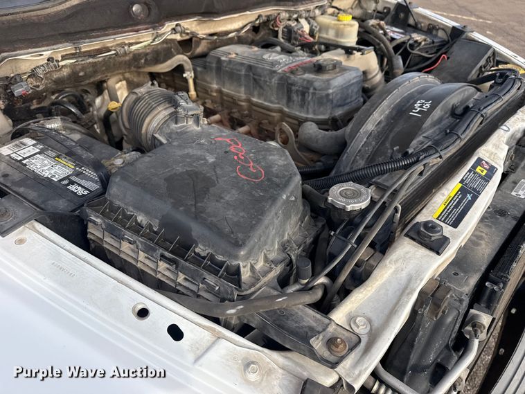 image for item EU4016 2006 Dodge Ram 2500 Quad Cab flatbed pickup truck