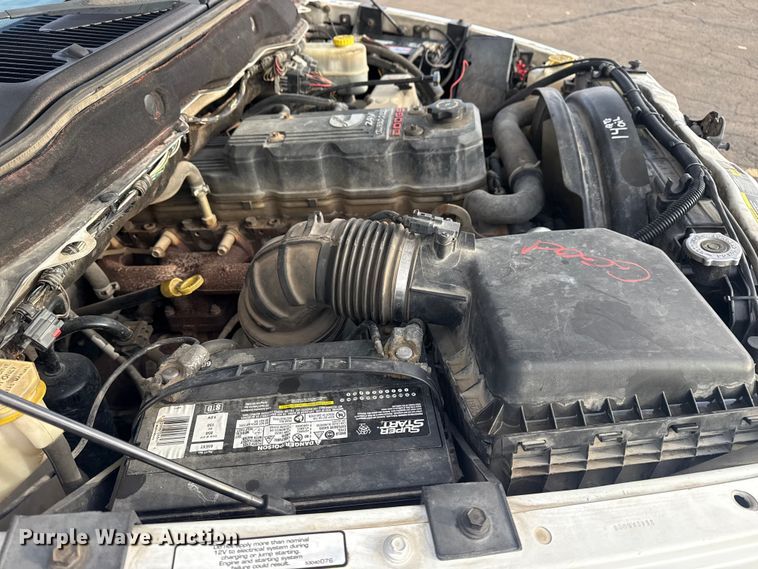 image for item EU4016 2006 Dodge Ram 2500 Quad Cab flatbed pickup truck