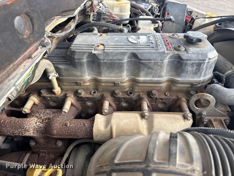 image for item EU4016 2006 Dodge Ram 2500 Quad Cab flatbed pickup truck