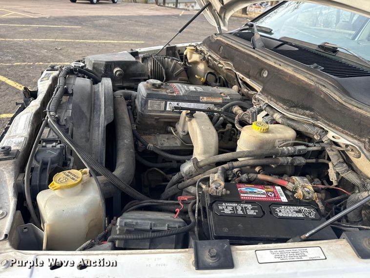 image for item EU4016 2006 Dodge Ram 2500 Quad Cab flatbed pickup truck