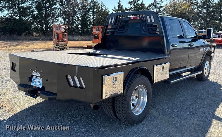 image for item EU5399 2016 RAM 3500 Crew Cab flatbed pickup truck