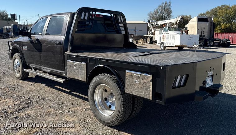 image for item EU5399 2016 RAM 3500 Crew Cab flatbed pickup truck