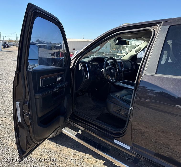 image for item EU5399 2016 RAM 3500 Crew Cab flatbed pickup truck