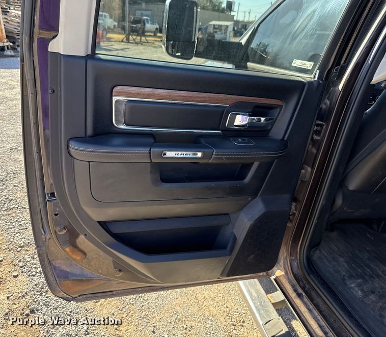 image for item EU5399 2016 RAM 3500 Crew Cab flatbed pickup truck