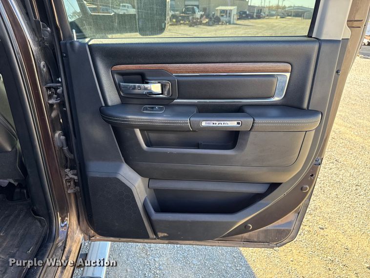 image for item EU5399 2016 RAM 3500 Crew Cab flatbed pickup truck