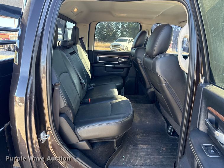 image for item EU5399 2016 RAM 3500 Crew Cab flatbed pickup truck