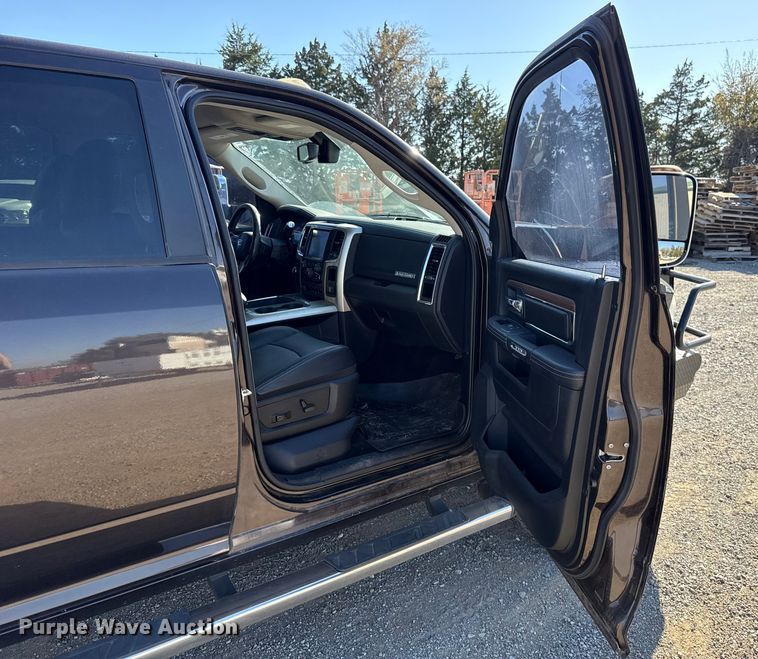 image for item EU5399 2016 RAM 3500 Crew Cab flatbed pickup truck