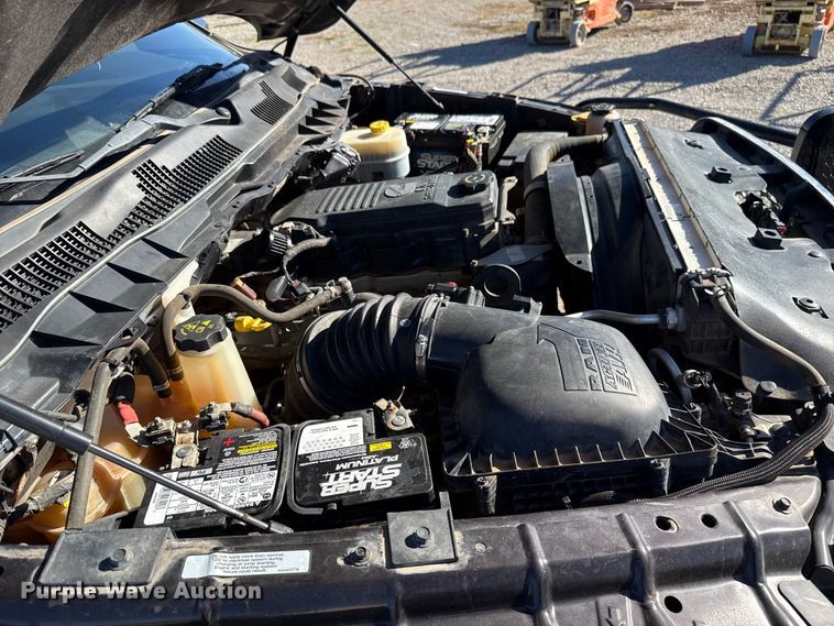 image for item EU5399 2016 RAM 3500 Crew Cab flatbed pickup truck