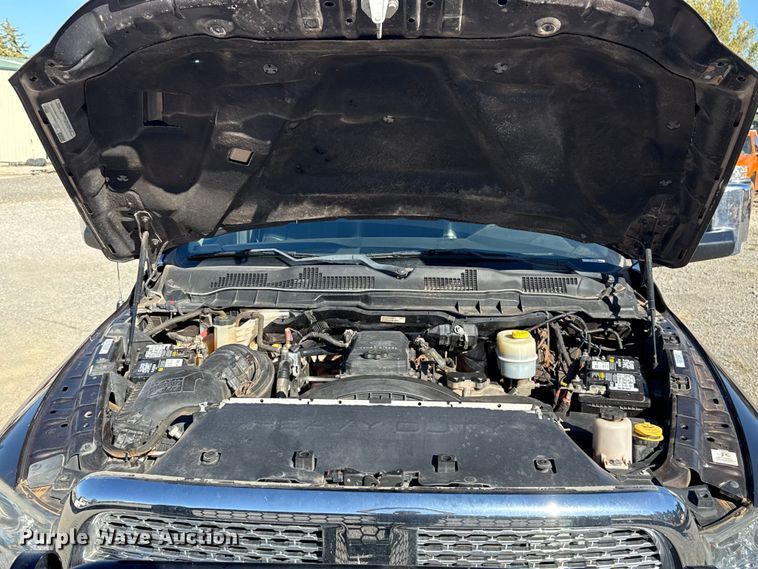 image for item EU5399 2016 RAM 3500 Crew Cab flatbed pickup truck