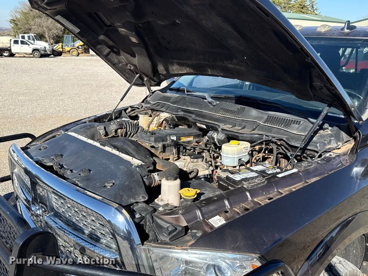 image for item EU5399 2016 RAM 3500 Crew Cab flatbed pickup truck