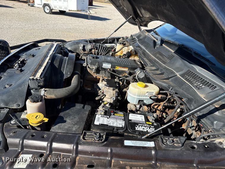 image for item EU5399 2016 RAM 3500 Crew Cab flatbed pickup truck