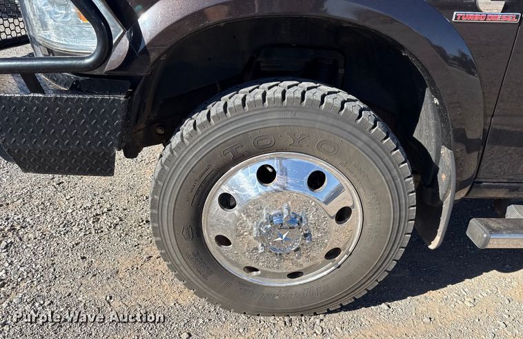 image for item EU5399 2016 RAM 3500 Crew Cab flatbed pickup truck