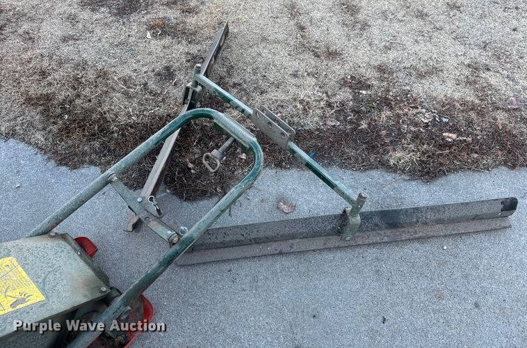 image for item EU6424 Cushman Core Harvester attachment 