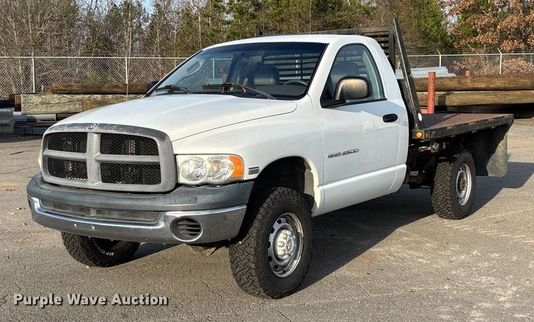 image for item EV3459 2004 Dodge Ram 2500 flatbed pickup truck