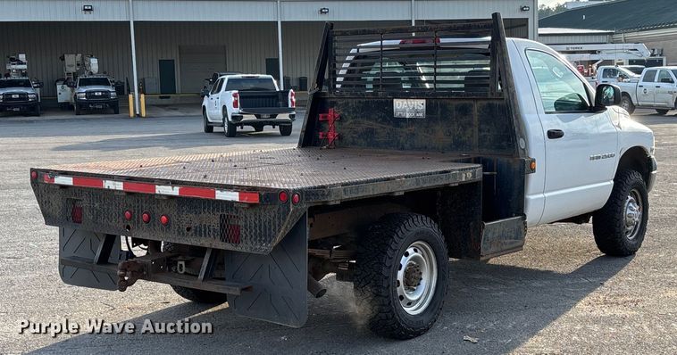 image for item EV3459 2004 Dodge Ram 2500 flatbed pickup truck