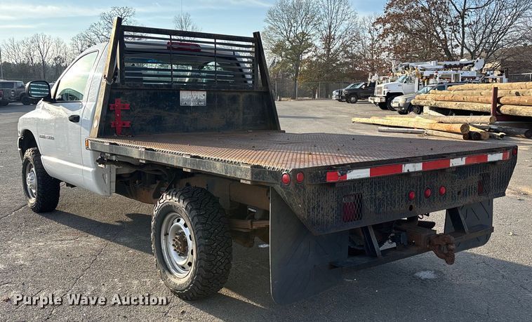 image for item EV3459 2004 Dodge Ram 2500 flatbed pickup truck