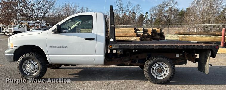 image for item EV3459 2004 Dodge Ram 2500 flatbed pickup truck