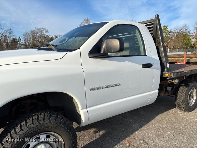 image for item EV3459 2004 Dodge Ram 2500 flatbed pickup truck
