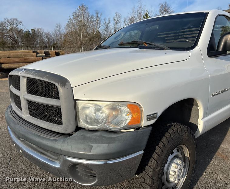 image for item EV3459 2004 Dodge Ram 2500 flatbed pickup truck