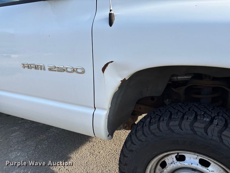 image for item EV3459 2004 Dodge Ram 2500 flatbed pickup truck