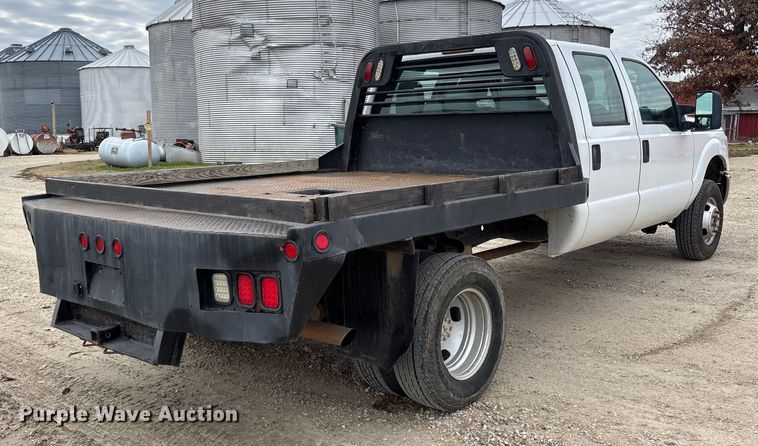 image for item EV3475 2013 Ford F350 Super Duty Crew Cab flatbed pickup truck
