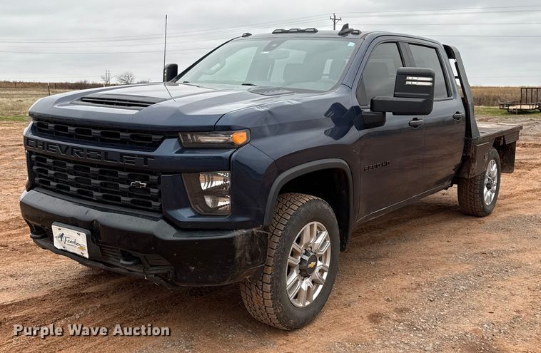 image for item HI9397 2021 Chevrolet Silverado 2500HD Crew Cab flatbed pickup truck