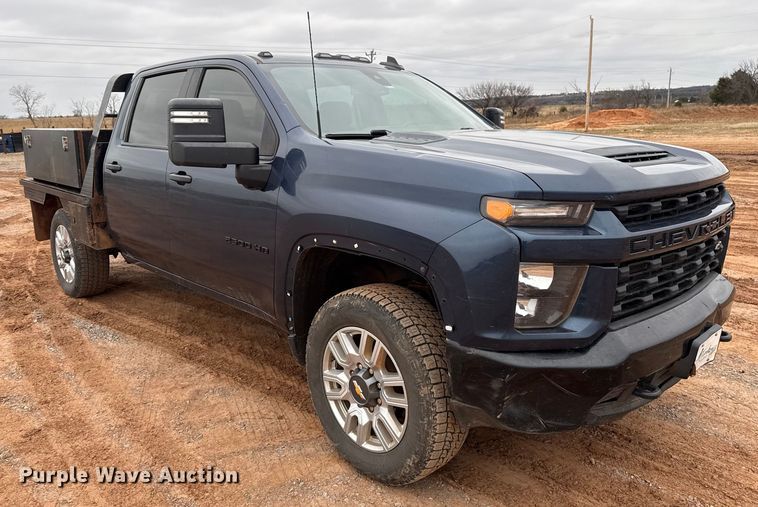 image for item HI9397 2021 Chevrolet Silverado 2500HD Crew Cab flatbed pickup truck
