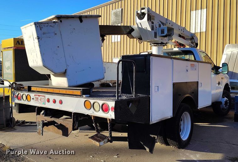 CAMIóN CON CANASTILLA 2002 FORD ALTEC